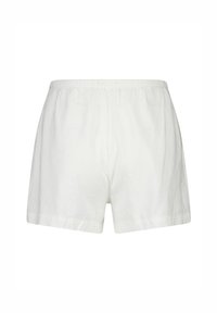 Bílé šortky s elastickým pasem, volný střih a jednoduchá, hladká látka, zobrazené zezadu na čistém bílém pozadí.