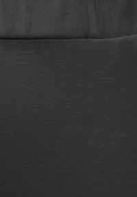 Black fabric with a textured surface featuring a subtle pattern. The material appears durable and is evenly woven without glossy finish.