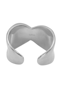 Anello in acciaio inossidabile argentato con un design aperto, caratterizzato da bordi curvi e una finitura liscia e lucida. Inciso all'interno con "S.steel."