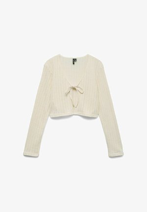 Cárdigan de punto color crema, de manga larga, con apertura frontal anudada en un lazo, con largo corto y patrón texturizado sutil.