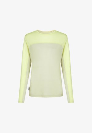 Camisa de manga larga en amarillo claro, con un diseño de panel contrastante, textura suave, escote redondo y detalle de etiqueta lateral.