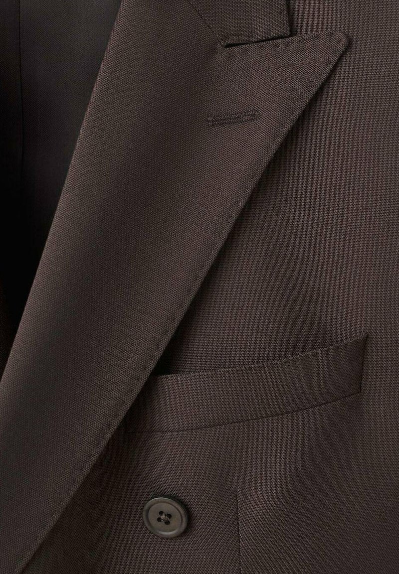 Brown blazer featuring a smooth texture, single button closure, notch lapel, and a side pocket. The fabric has a subtle pattern.