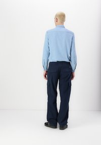 Tommy Jeans JAIMIE LOOSE - Cargo trousers - dark night navy