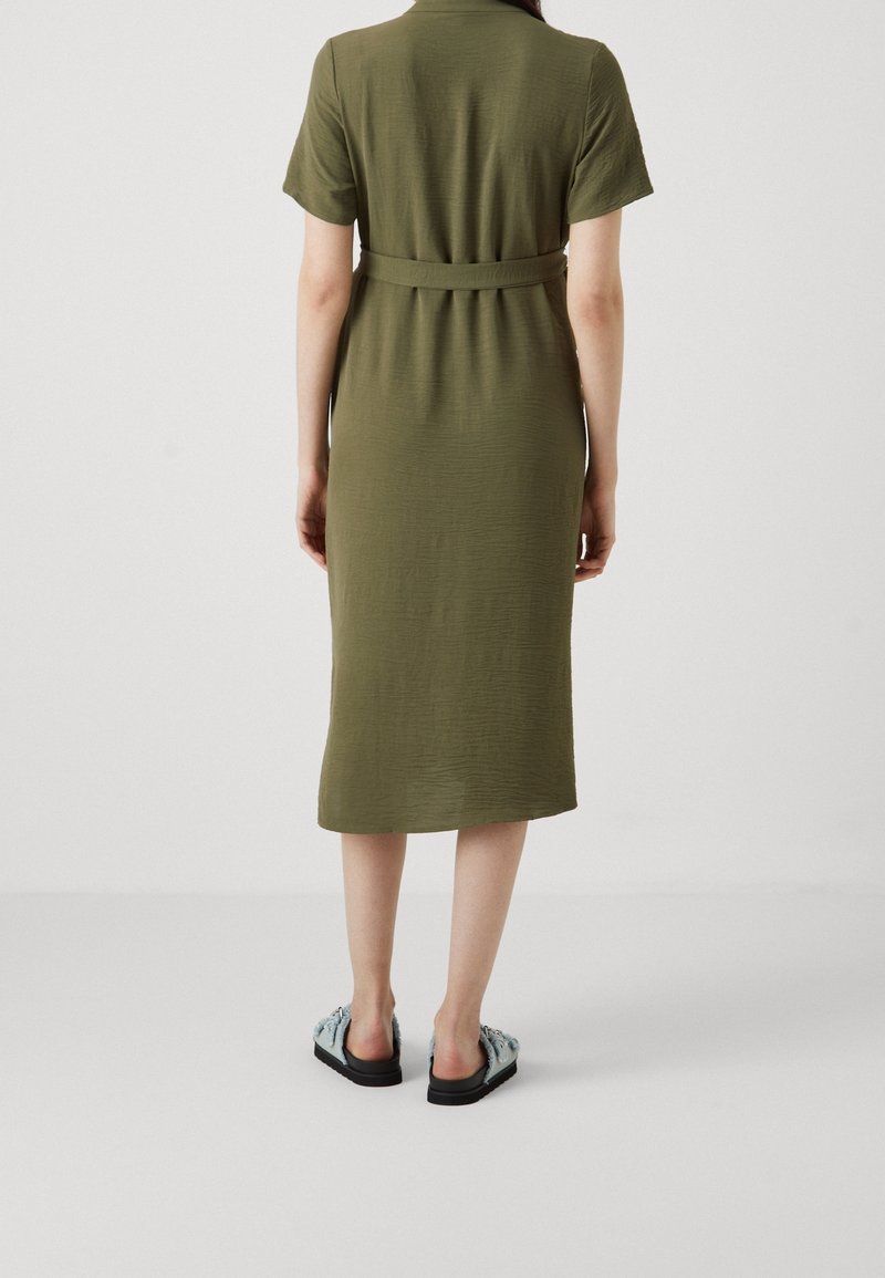 vero moda olive green dress Vero Moda plisse jersey maxi dress with asymmetric hem in olive green