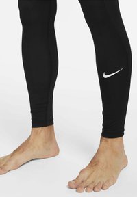 Nike Performance - Kalesony