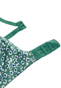 Zielony stanik w leoparda w białe i niebieskie wzory. Posiada regulowane ramiączka oraz zapięcie na haftkę dla lepszego dopasowania.