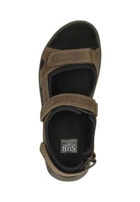 Brown sandal with adjustable velcro straps, cushioned footbed, and textured sole. Features a slightly raised heel and logo detail.