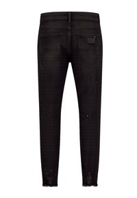 Črne skinny jeans iz denim materiala z distressed izgledom, z raztrganimi robovi, dvema zadnjima žepoma in majhnimi turkiznimi detajli na nogah.