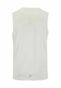 Mouwloos sportshirt in lichtbeige met perforaties voor ventilatie, verticaal gecentreerd in de bovenrug en een klein logo nabij de onderzoom.