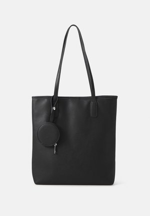 Sac fourre-tout en cuir noir avec deux longues bandoulières et une petite pochette ronde zippée attachée à une bandoulière.