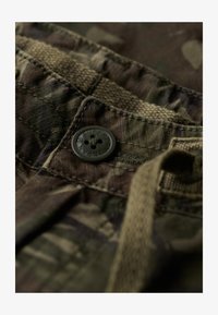 Geselecteerd, outline camo