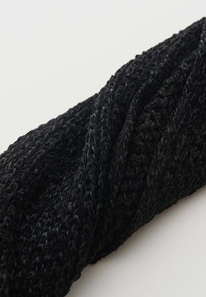 Black knitted headband with a textured pattern, twisted in the center, displayed on a plain white background.