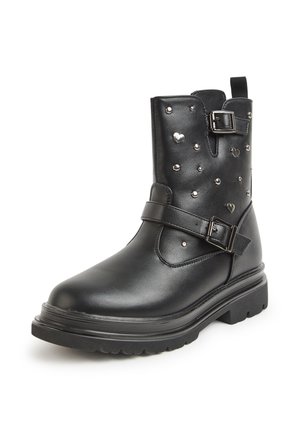 - Botki kowbojki i motocyklowe