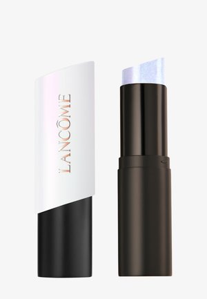 Baume à lèvres irisé lavande Lancôme avec base noire et bouchon blanc, bouchon placé à côté du rouge à lèvres.