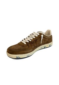 Brown suede sneaker with perforated toe box, cream laces, and contrasting white midsole featuring blue and yellow accents.