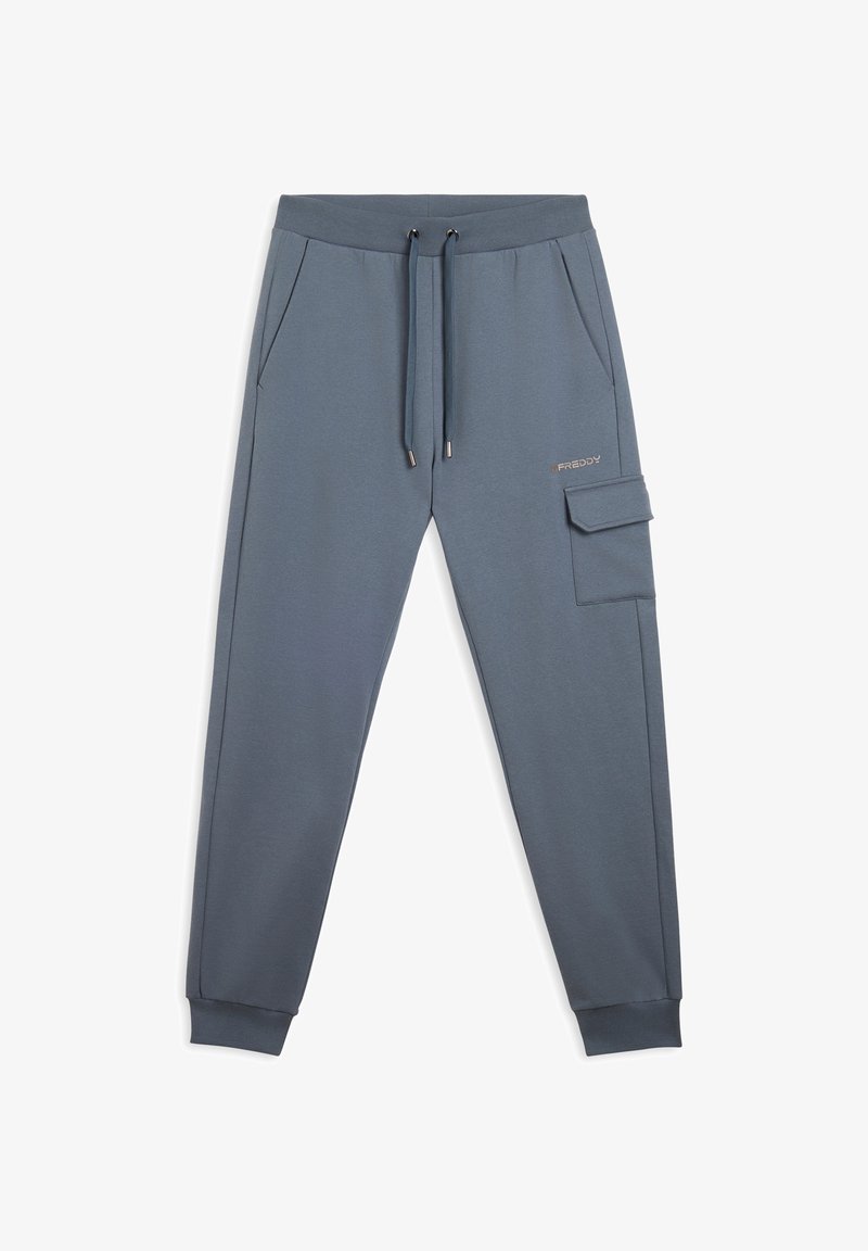 Pantalon de jogging gris en tissu doux, doté d'une taille élastique avec cordon de serrage, de poches latérales et d'une poche cargo sur la jambe droite.
