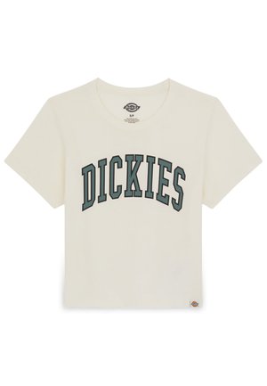 Rövid ujjú krém színű póló, kerek nyakkal, sötétzöld "DICKIES" felirattal a mellkason. Pamut anyag.