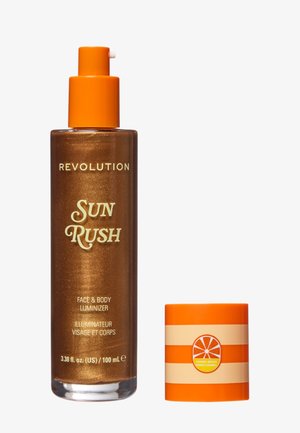 Bronzefarbene Pumpspender-Flasche des Revolution Sun Rush Gesicht- und Körperluminizers mit orange gestreiftem Verschluss und Zitrusscheiben-Logo.