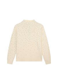 Kremowy sweter z wysokim kołnierzem i długimi rękawami, ozdobiony rozproszonymi czarnymi i srebrnymi zdobieniami na plecach. Miękka w dotyku.