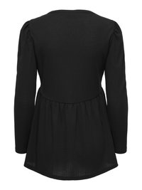 Blouse noire à manches longues avec taille froncée et épaules légèrement bouffantes, vue de dos sur fond blanc.
