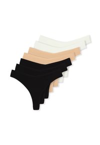 Braguitas tanga en colores negro, beige y blanco, con un tejido liso y elástico, diseño de tiro bajo y forma minimalista.