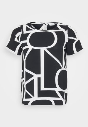 Svart och vit kortärmad topp med geometriska mönster, rund halsringning och detalj med stängning i ryggen. Slät tygtextur.