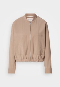 Veste bomber beige clair avec fermeture éclair à l'avant, ourlet élastique, manches longues et deux grandes poches avant, présentée sur fond blanc.