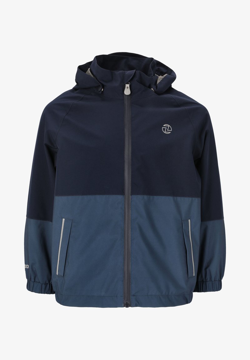 Tummansininen tuulipuku, jossa on vaaleansiniset alaosat, joustavat hihansuut, vetoketjullinen etuosa ja sivutaskut; sisältää heijastavia yksityiskohtia.