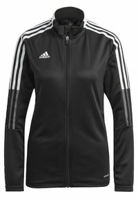 Giacca sportiva nera con zip completa, realizzata in tessuto liscio. Presenta strisce bianche sulle maniche e un colletto alto. Logo Adidas presente.
