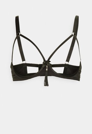 Black bralette with a sheer mesh back, featuring crisscross straps, a central bow detail, and a decorative tassel on the center front.