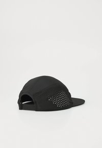 Black cap with a curved visor, featuring mesh ventilation on the side, adjustable back strap, and smooth fabric texture.