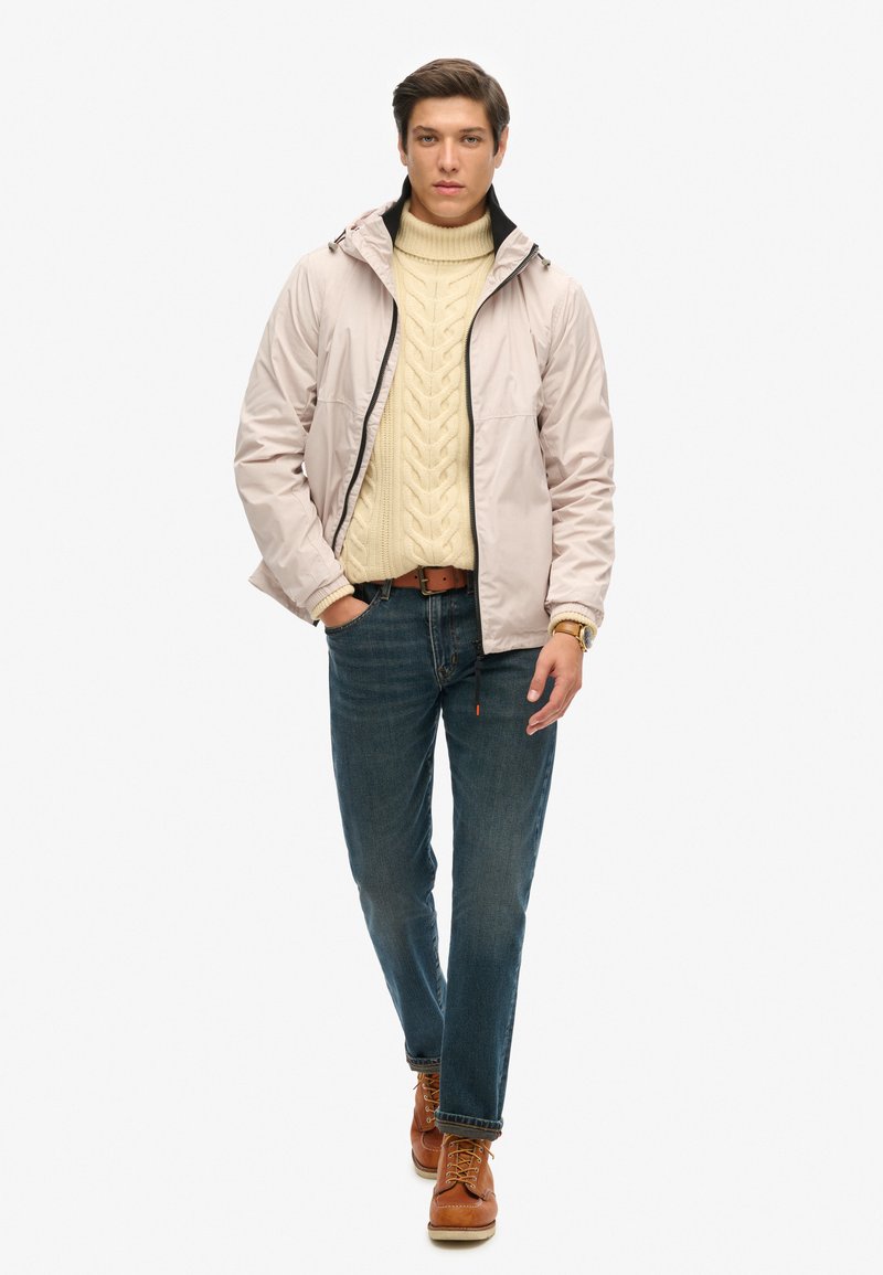 Superdry & Co Trainingsvest beige Superdry & Co Trainingsvest beige