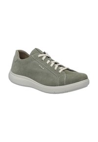 Baskets en daim vert avec profil bas, semelle en caoutchouc blanc et lacets beige contrastants. Présente une couture décorative sur les côtés.