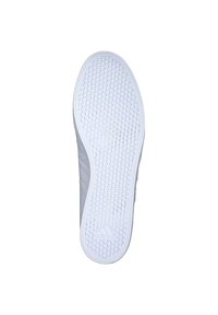 White sneaker sole with a hexagonal grip pattern, smooth edges, and a slight incline. Features an embossed logo on the side.
