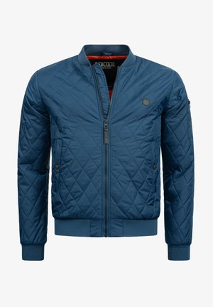 Kurtka bomber pikowana w granatowym kolorze, z zamkiem z przodu, ściągaczami przy mankietach, bocznymi kieszeniami oraz przeszyciami dla dodatkowej tekstury.