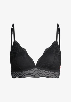 Black sheer bra with wavy mesh pattern, adjustable thin straps, and a scalloped-edge band beneath the cups.