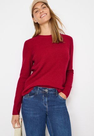 - Sweter