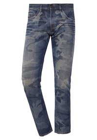 Denimjeans med ett kamouflagemönster i nyanser av blått, med slim fit, femfickorsdesign och dragkedja med knappstängning.