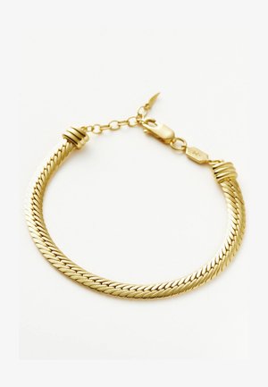 Kuldtooni käevõru keerduva disainiga, millel on homaariklamber ja kihilised, põimitud osad. Sile pind ja poleeritud viimistlus.