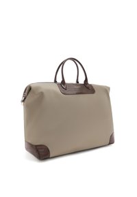 Beige tas met een gladde buitenkant, bruine leren accenten en een gestructureerde basis met krokodillenpatroon. Heeft dubbele ronde handvaten en een gestructureerde vorm.