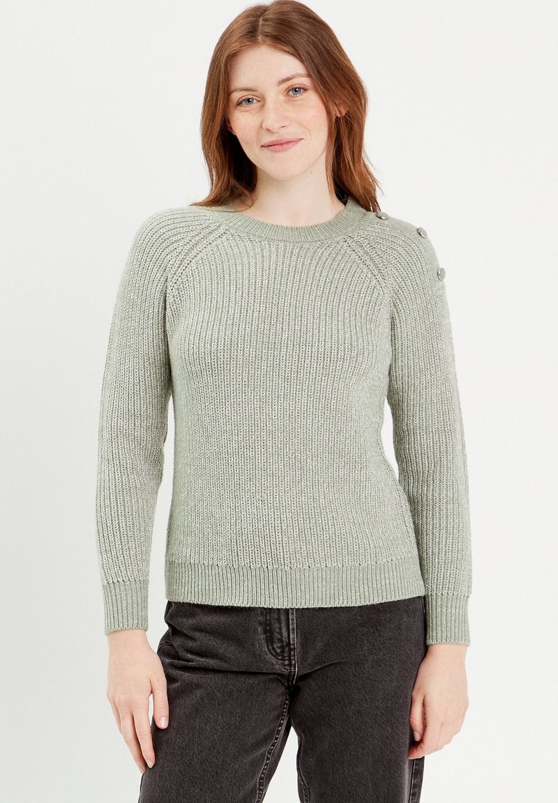 Pull en tricot vert clair avec texture côtelée, encolure ronde et manches longues. Présente des accents de boutons sur l'épaule et une taille ajustée.