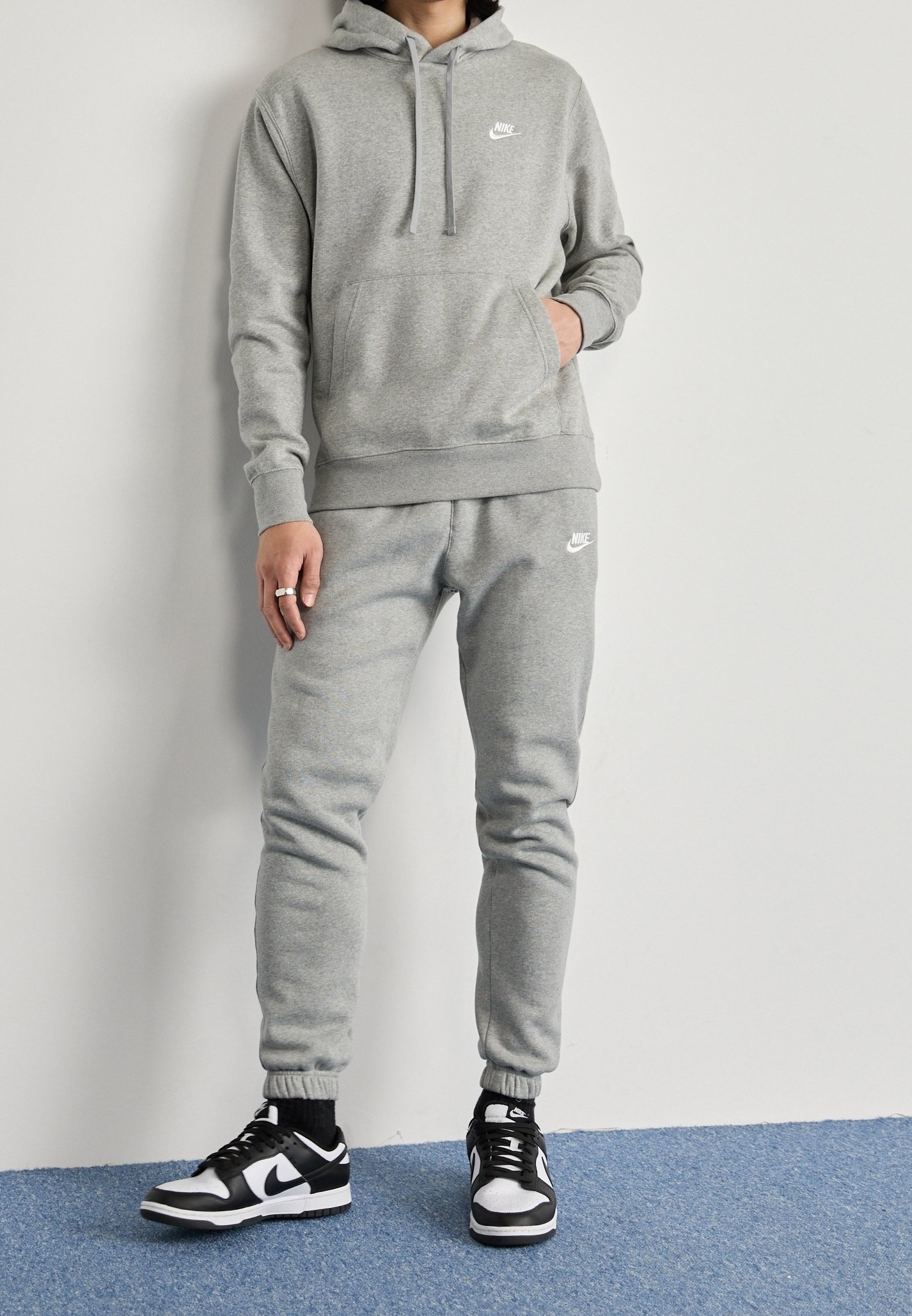 grey nike hoodie and joggers
