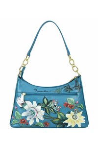 Turkooise leren schoudertas met florale ontwerpen in wit, geel en groen. Beschikt over een gebogen bovenkant, gouden hardware en een ritssluiting.