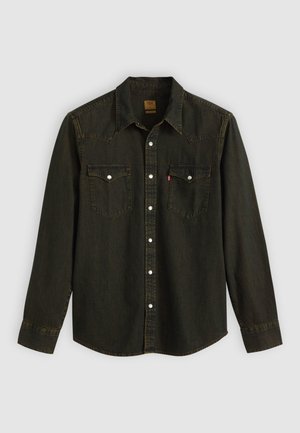Zwart denim overhemd met lange mouwen, puntige kraag, twee borstzakken, zilveren knopen en gele stiksels. Klassiek westers ontwerp.
