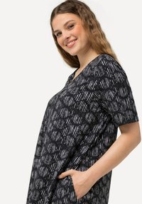 Ulla Popken PRINT - Trikoomekko - black