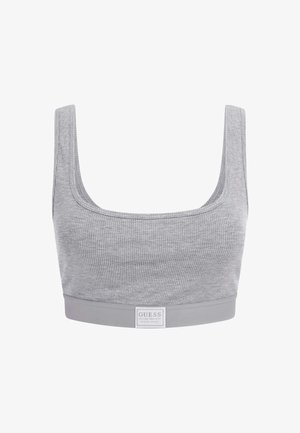 Bralette gris à côtes avec un décolleté arrondi, des bretelles larges et une taille plate arborant une étiquette de marque au centre.