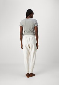 Tommy Hilfiger TRACK PANTS  - Pyjama bottoms - heathered oat