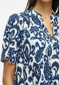 VILA MINI VIMERLE V-AUSSCHNITT - Vestito casual - cloud dancer