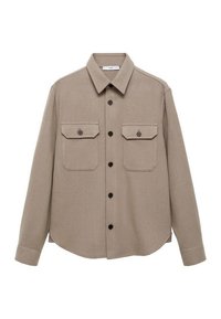 Beige overhemdjack gemaakt van zachte stof, met twee borstzakken, een knoopsluiting aan de voorkant en zwarte knopen. Rondom afgeronde zoom en lange mouwen.