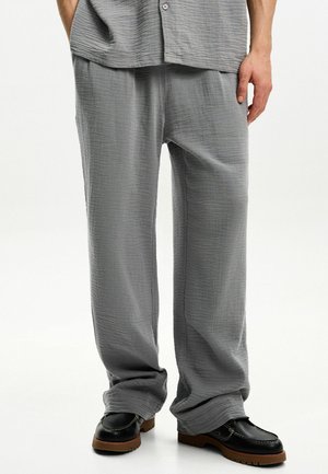 Spodnie materiałowe